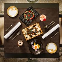 Top view on a dishes served in Vanitas at Palazzo Versace Dubai