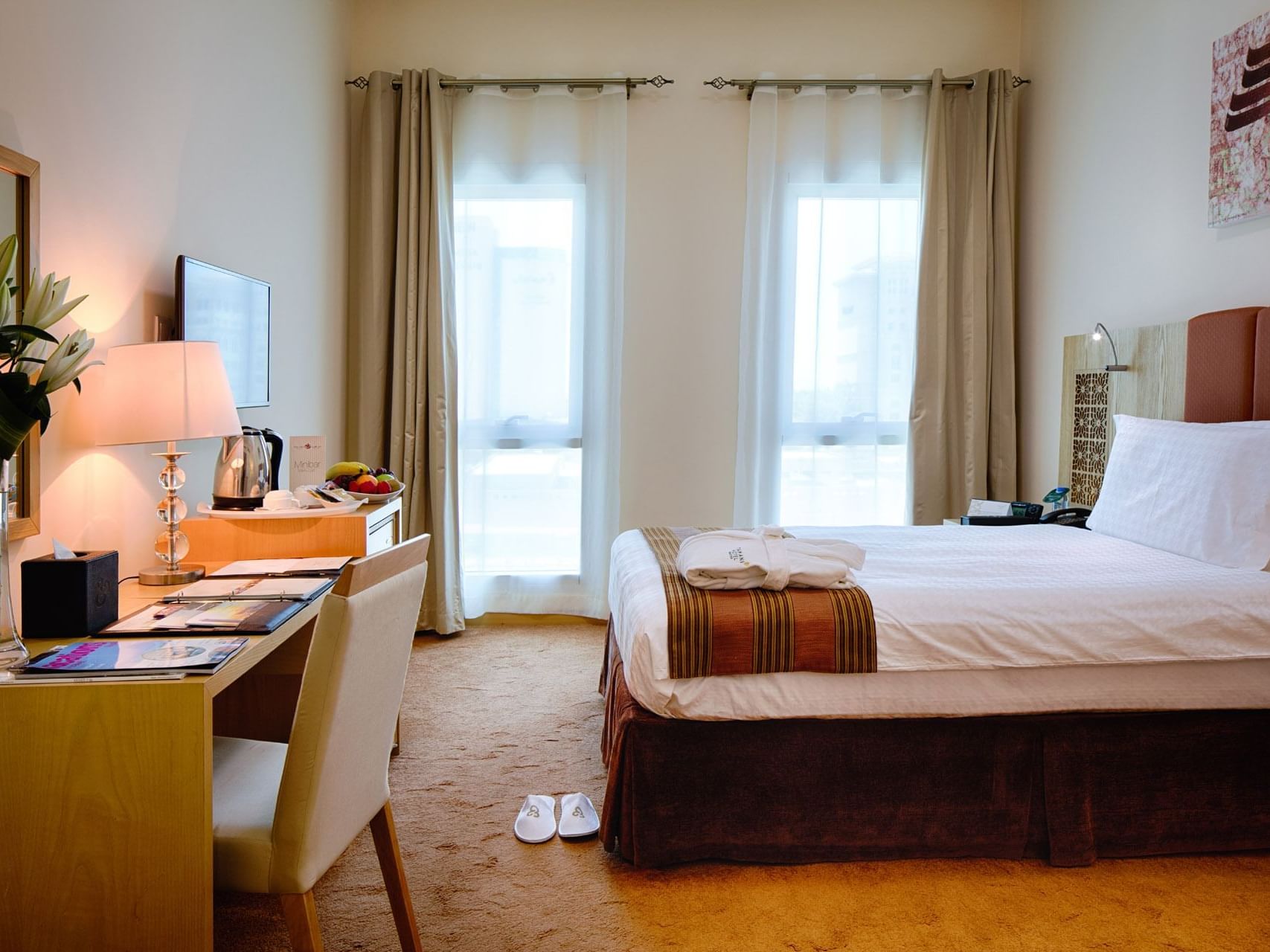 Interior of a singleroom with a bed at Tamani Marina Hotel