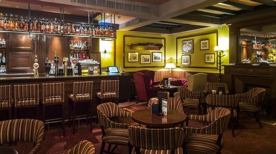 The English Bar lounges & bar counter at Athenee Palace Hilton Bucharest