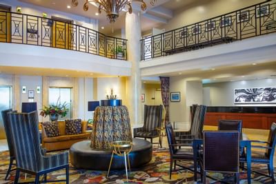 The stunning hotel lobby with modern art and plush seating offers a welcoming ambiance at Paramount Hotel Portland