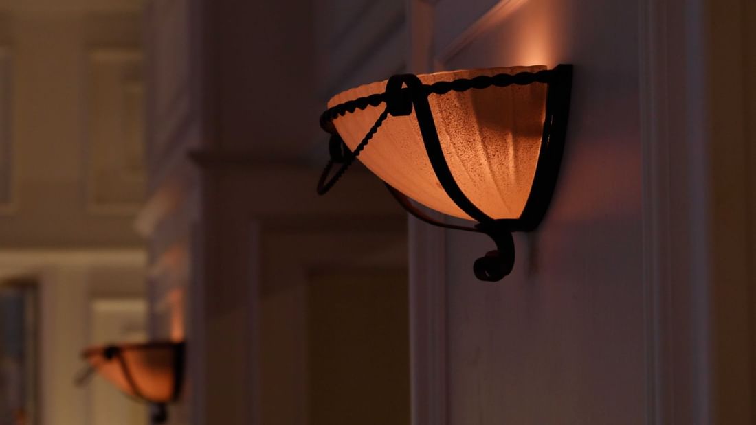Close-up of a lamp shed on a wall at Sunway Hotel Hanoi