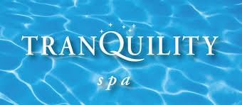Logo of Tranquility Spa with a pool background at Infinity Bay