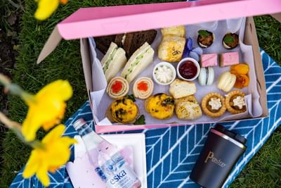 Box of savory & sweet treats in Pendray Tea House at Pendray Inn & Tea House