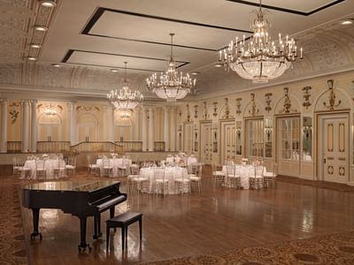 Arranged Continental Ballroom with a piano at Peabody Hotels