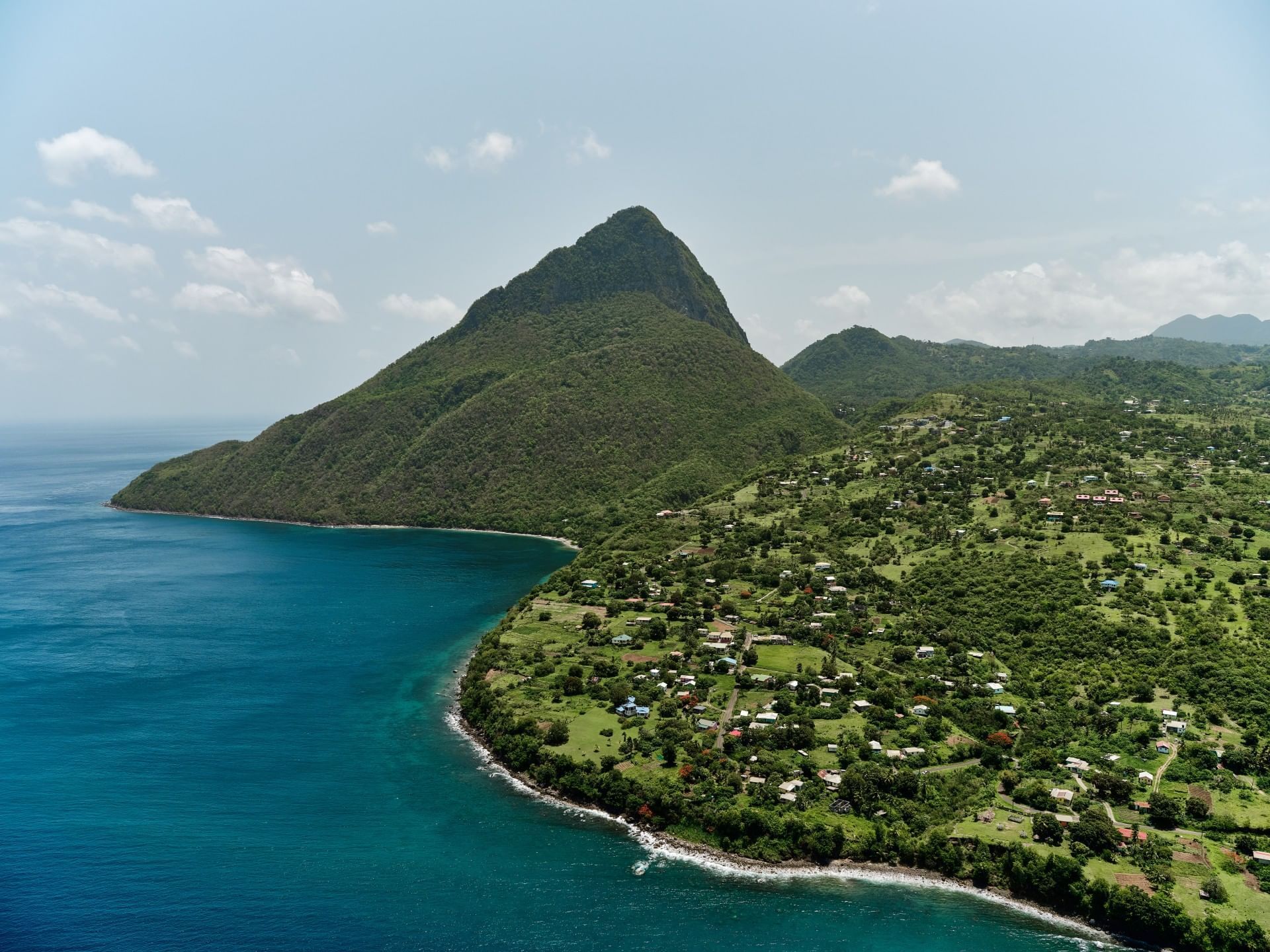 Coastal landscape with a mountain peak near the sea near Ladera Resort one of the St Lucia attractions