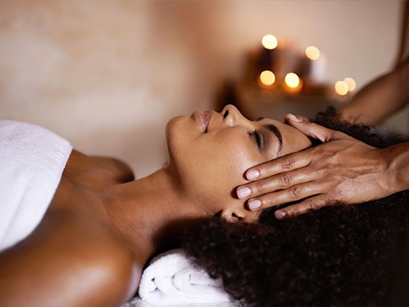 A Lady getting a head Massage at Casa Colonial Beach and Spa