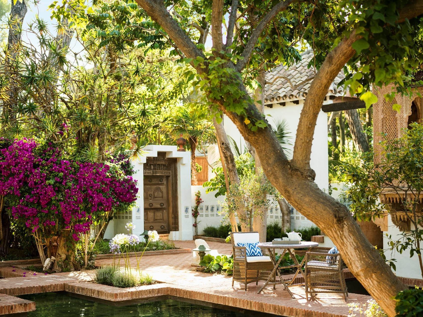 Exterior Hangout Area Surrounded by Trees and Flowers -  Farah Casablanca Hotel