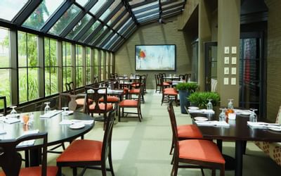 Dining table set-up in 21 Lake Restaurant at Ethan Allen Hotel