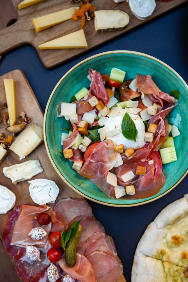 Close-up of a salad with cheese & veggies at Oceania Hotels