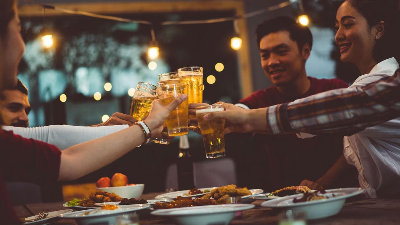 four people giving cheers