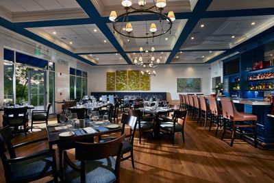 Dining area in Olde Florida Chop House at Trianon Bonita Bay