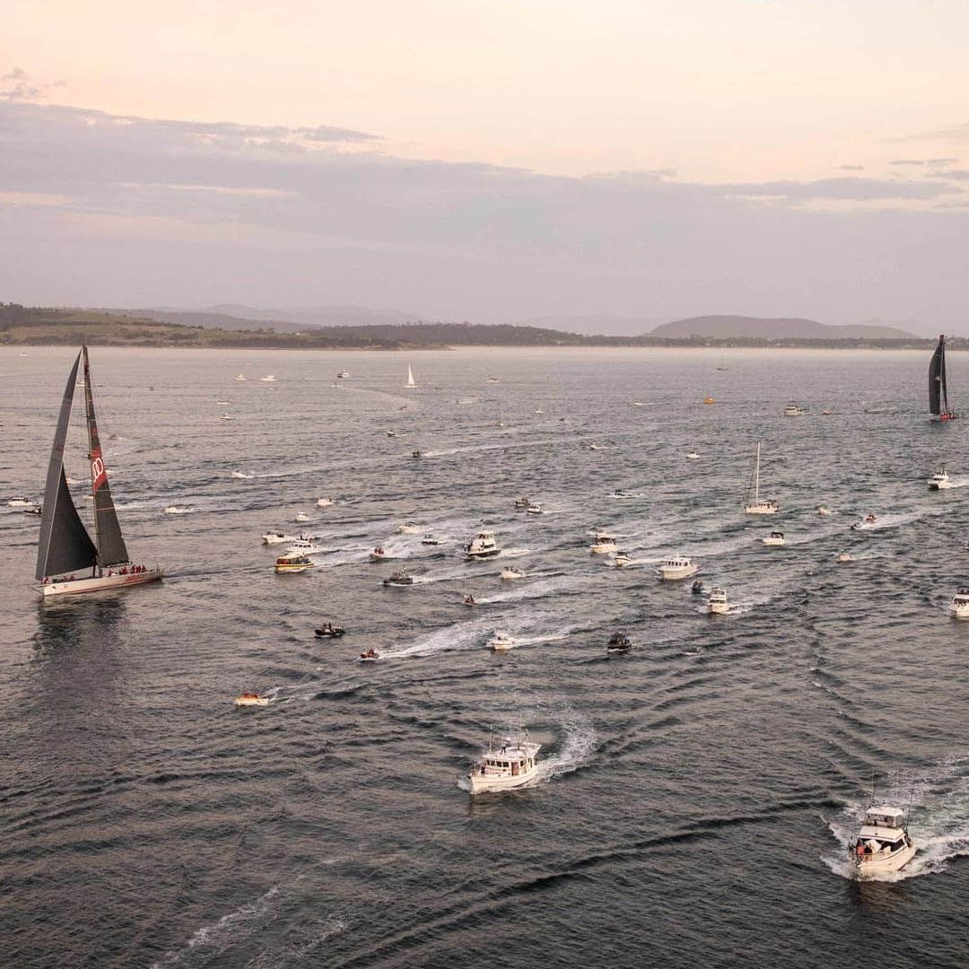 Aerial perspective of numerous yachts taking part in Hobart Yacht Race near Hotel Grand Chancellor Hobart