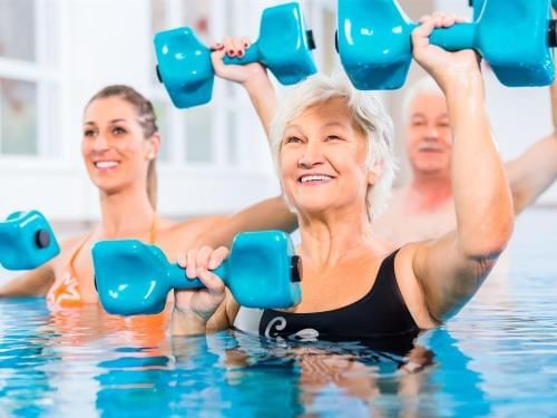 Peoples training in the pool at Grand Coloane Resort
