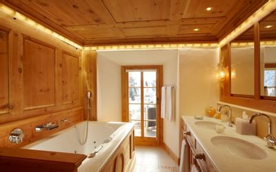 Family apartment bathroom at Precise Seehof Davos Klosters hotel