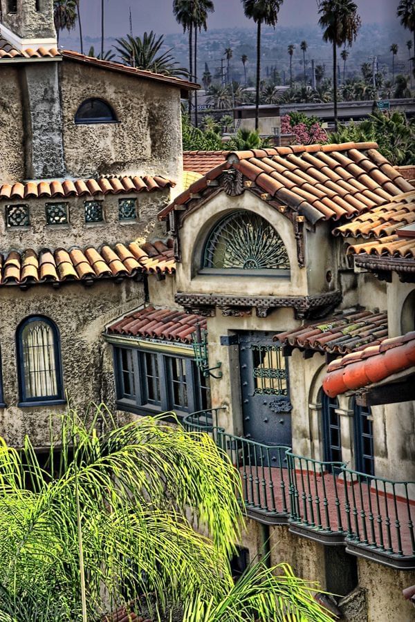 exterior of Mission Inn Hotel Riverside rooms with balcony