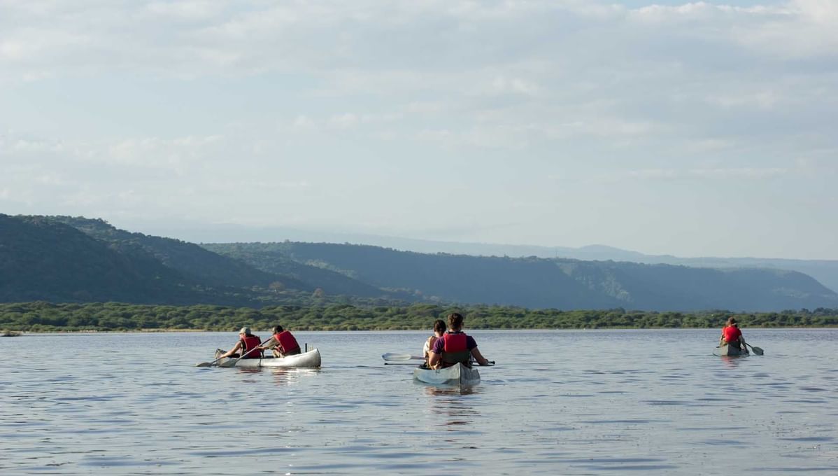 People on canoe safari on Lake Manyara near Serena Lodge