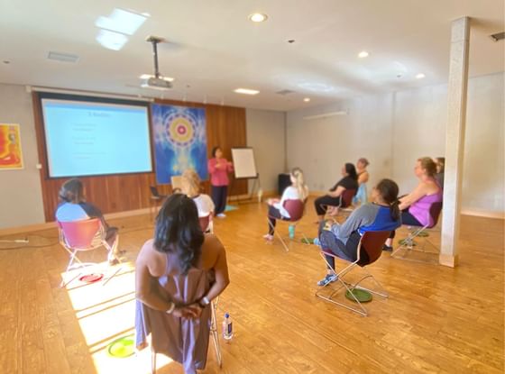 Women in an indoor session at Honor’s Haven