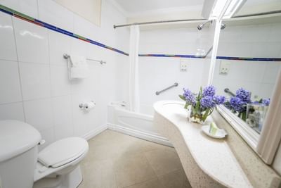 bathroom with long sink
