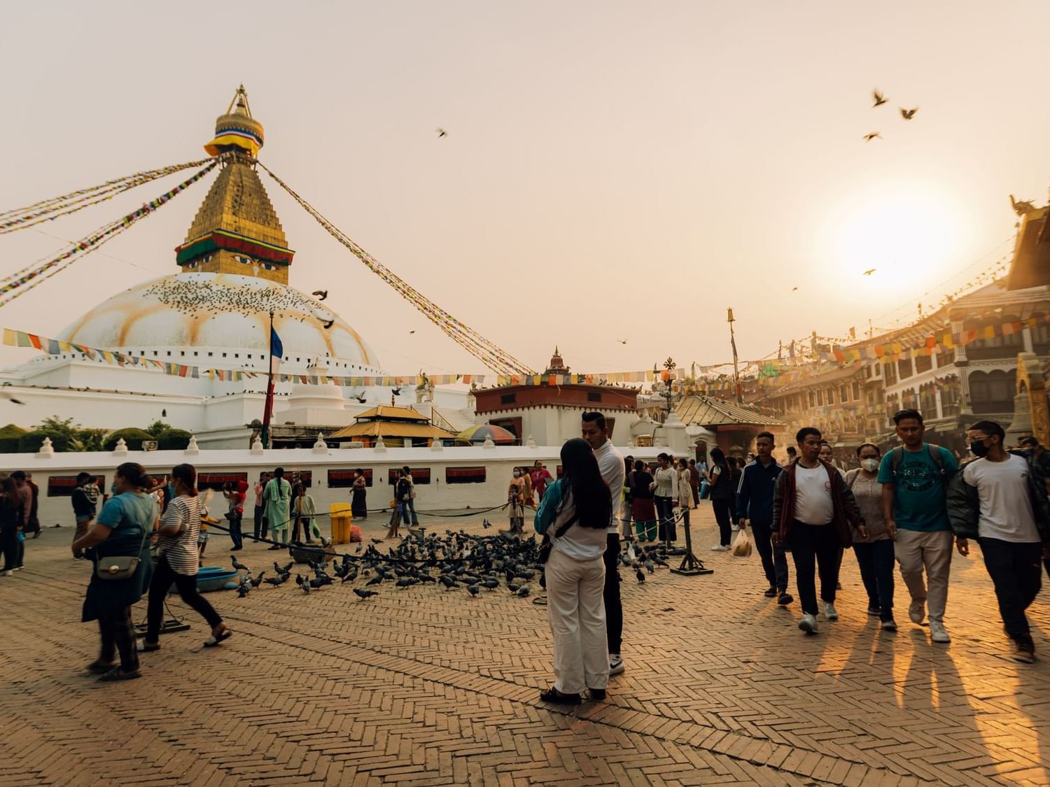 People gathered around the Boudhanath Stupa near The Dwarika’s Hotels and Resorts