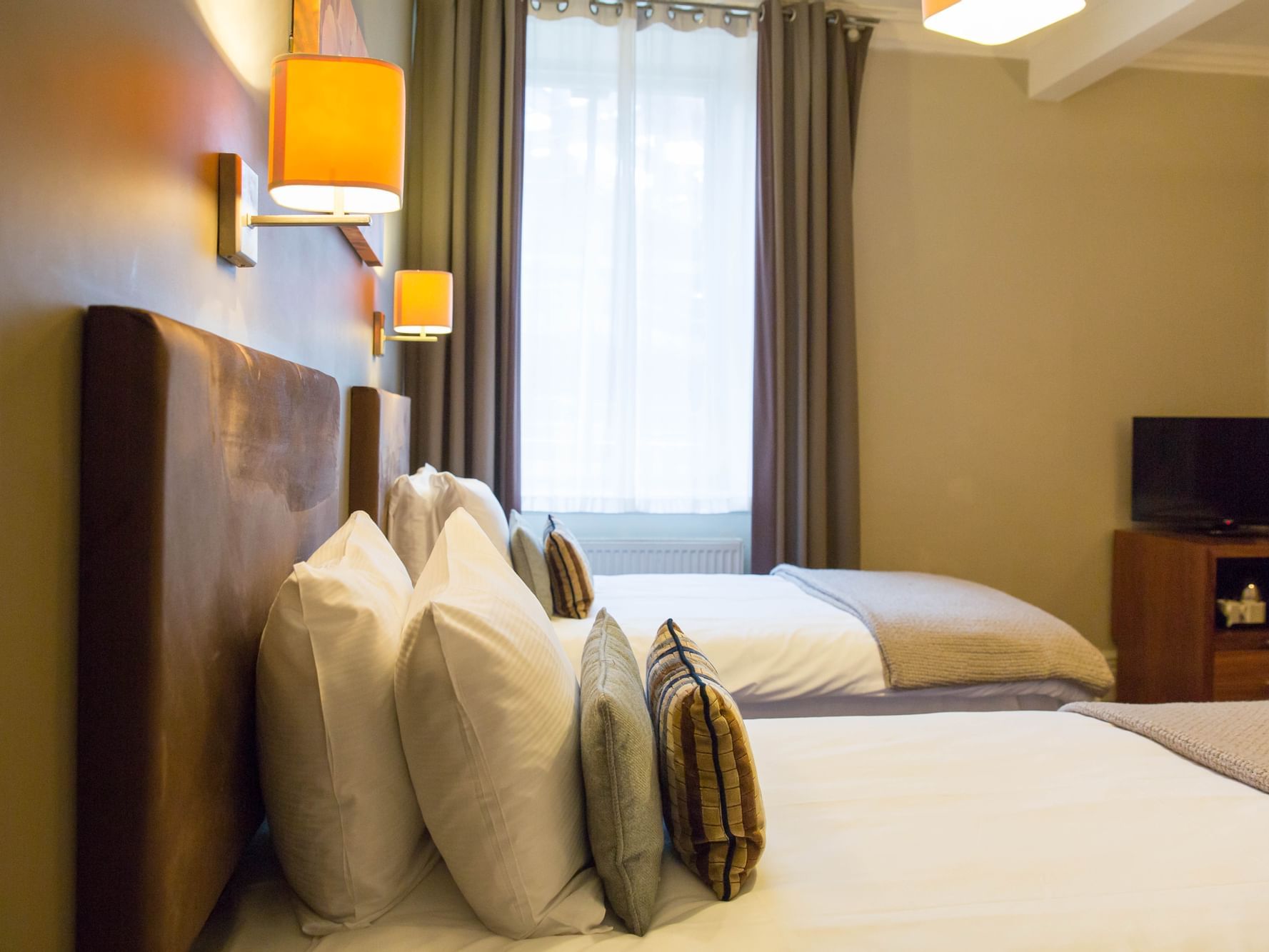 Close-up of bed pillows in Standard Twin Room at The Met Hotel