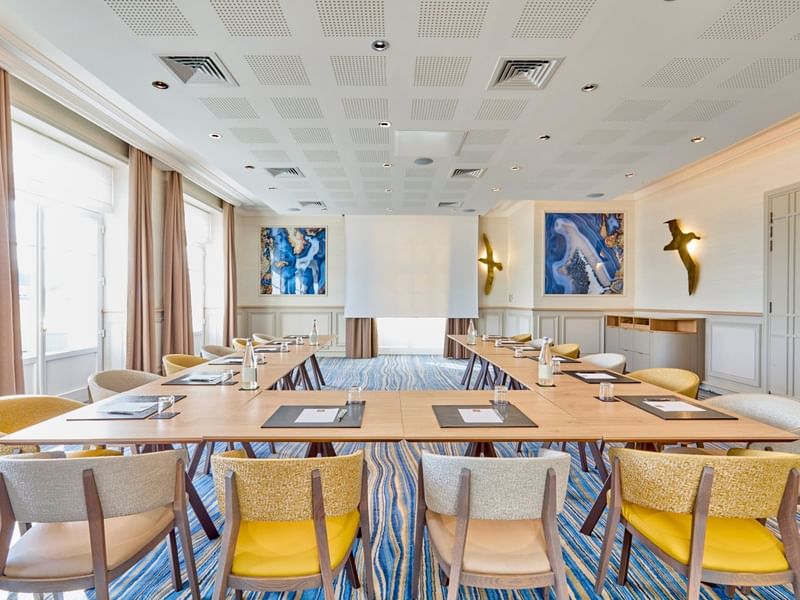 U-shaped table set up in a meeting room at Le Grand Hôtel des Thermes