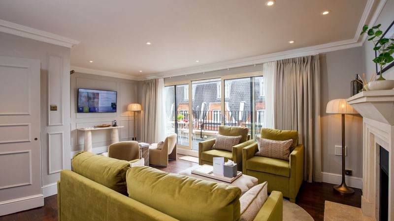 Luxury Lounge with balcony and fireplace at The Capital Hotel, Apartments & Townhouse London.