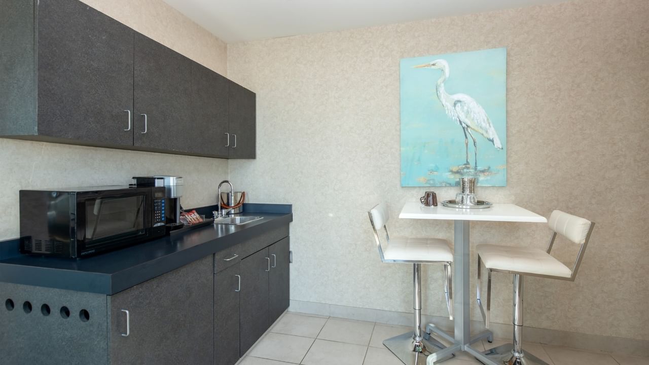 Coast Waterfront Suite sitting area and wet bar