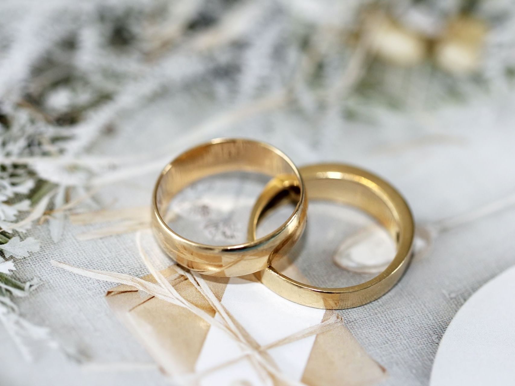 Close-up of wedding rings at Carlton Hotel Singapore