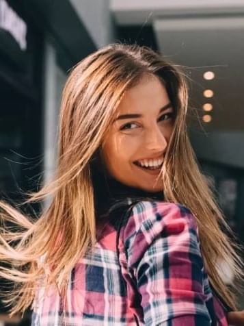 Girl smiling at the Sebel Residence Chatswood
