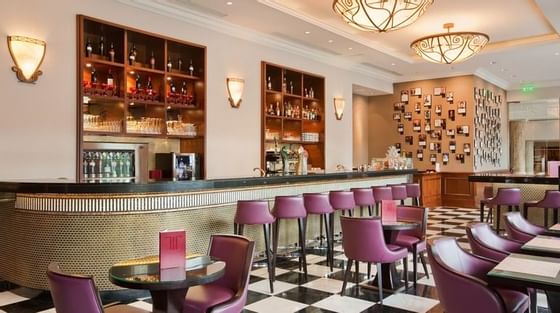 Restaurant interior with a bar counter at InterContinental Athénée Palace Bucharest