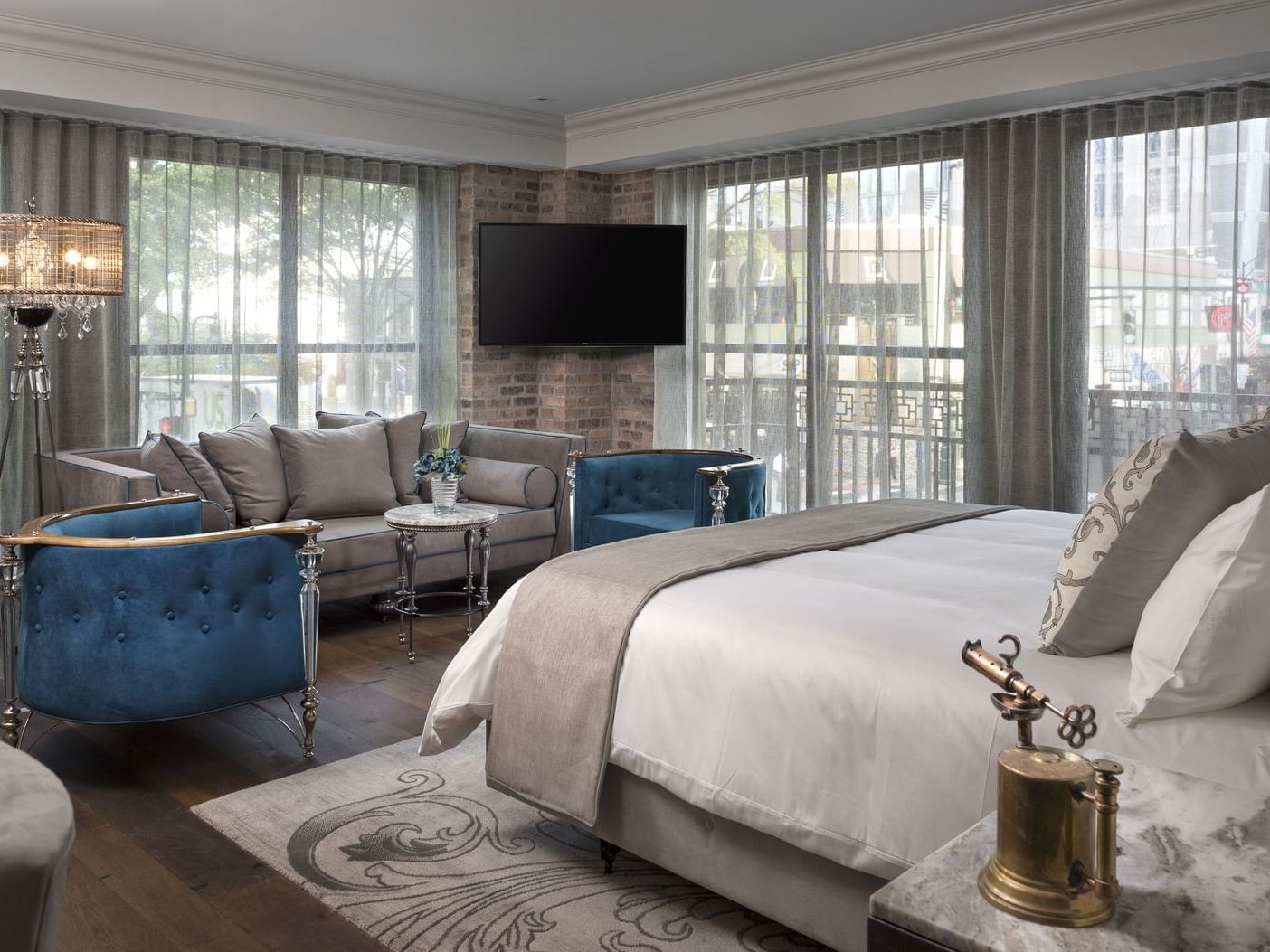 bed and couch in cozy room