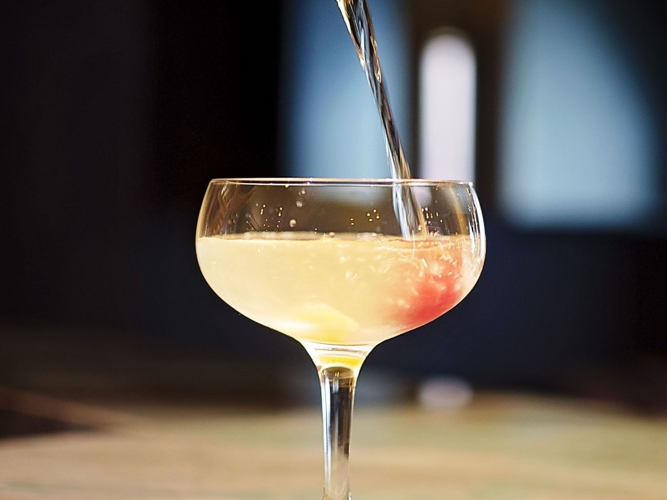 Close up on Champagne poured to a glass at The Time New York