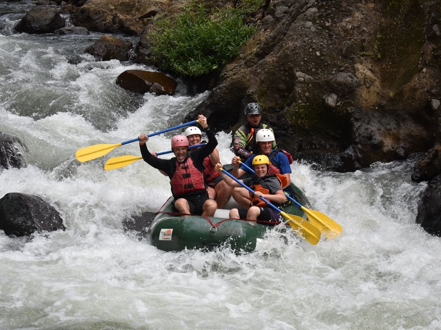 A group white Water Rafting near Rio Celeste Hideaway