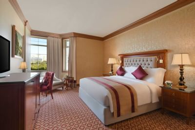 lateral view of deluxe room king bed