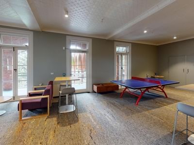 Games Room with table tennis and couches at UniLodge Herston.