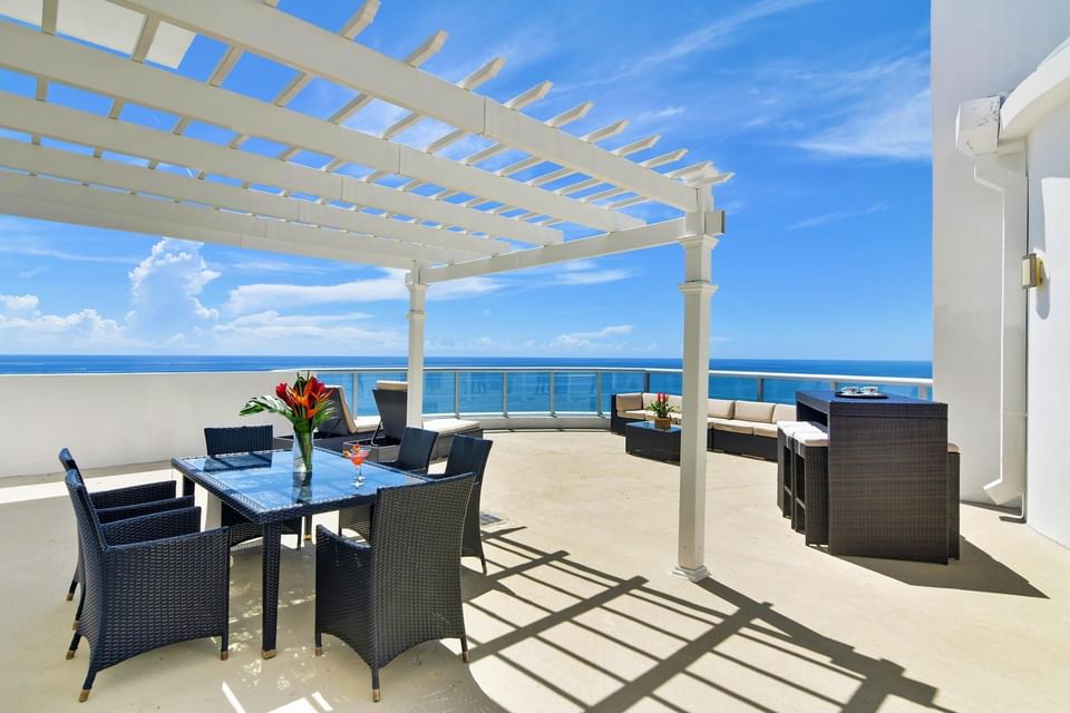 Dining table, chairs on Penthouse Terrace, Marenas Resort Miami