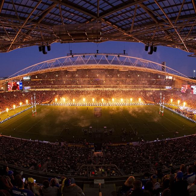 Distant view of the Accor Stadium filled with people near Pullman Sydney Olympic Park