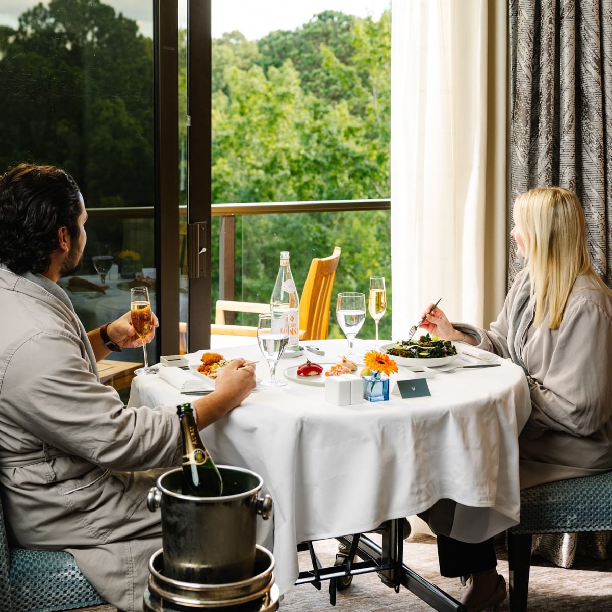 In Room Dining Guests enjoying sushi and salad