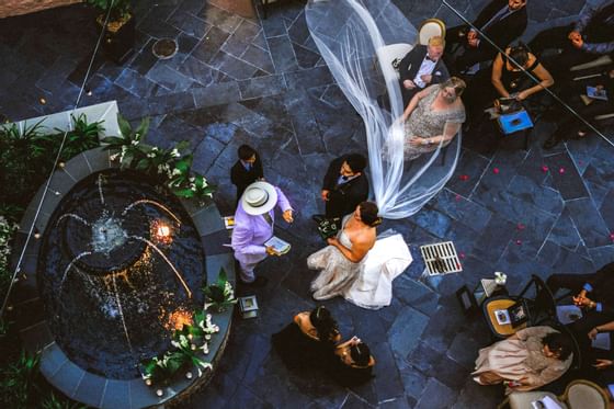 A wedding by the fountain at The Royal Frenchmen Hotel