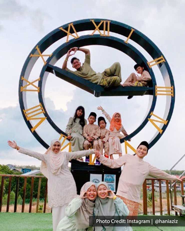 A group of people were striking a pose in front of the camera at the Sunflower Garden - Lexis Suites Penang