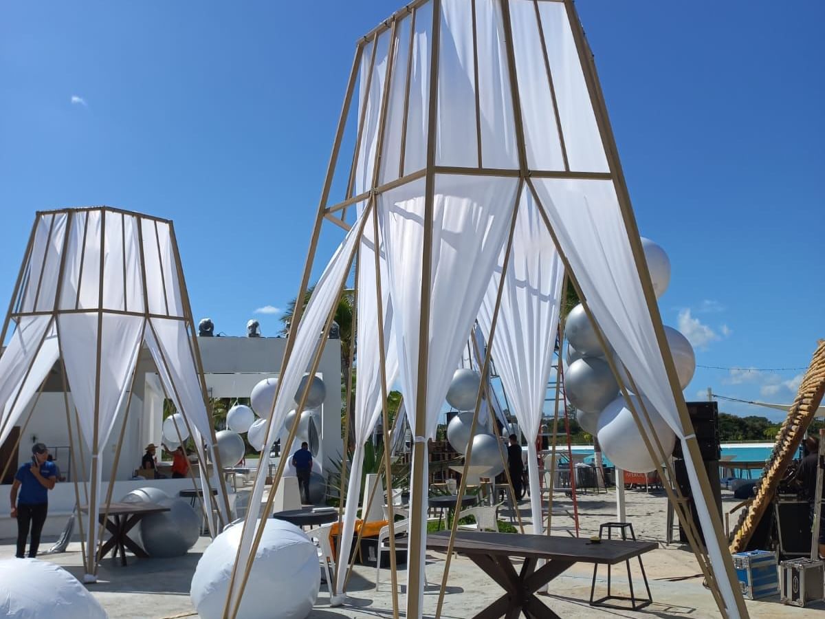 Modern white fabric structures in Charlotte at Playa Blanca Beach Resort