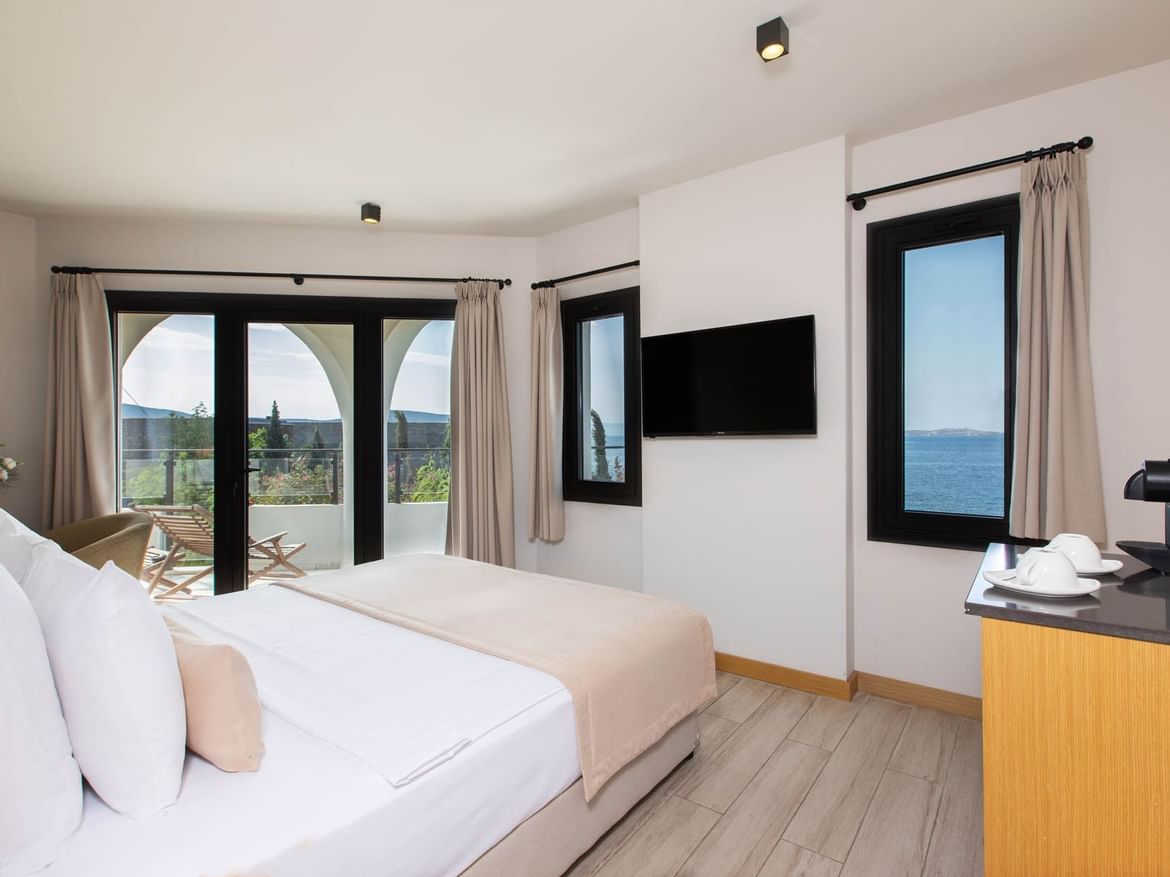 Bed & Tv in Standard Sea View With Balcony at Senses Hotel