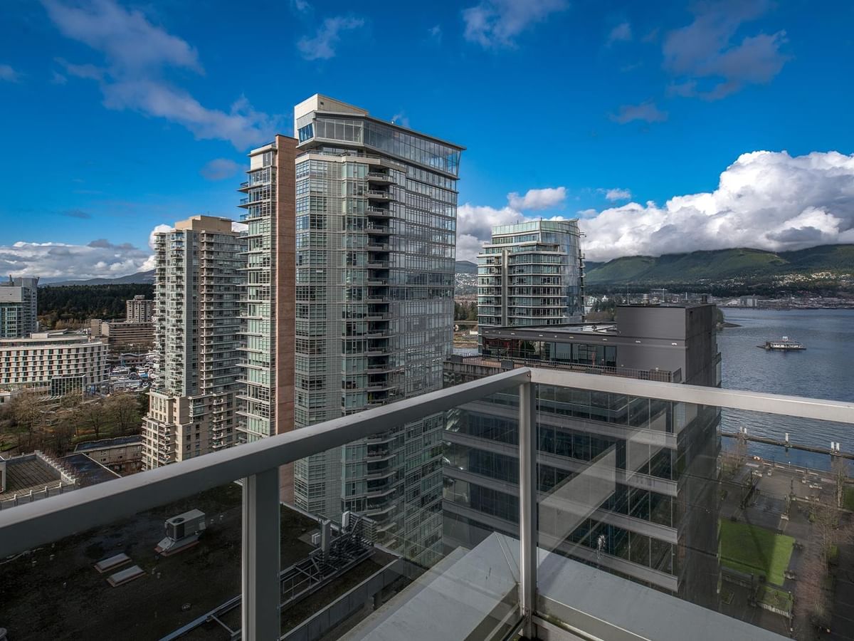 Balcony view of cityscape and waterfront.