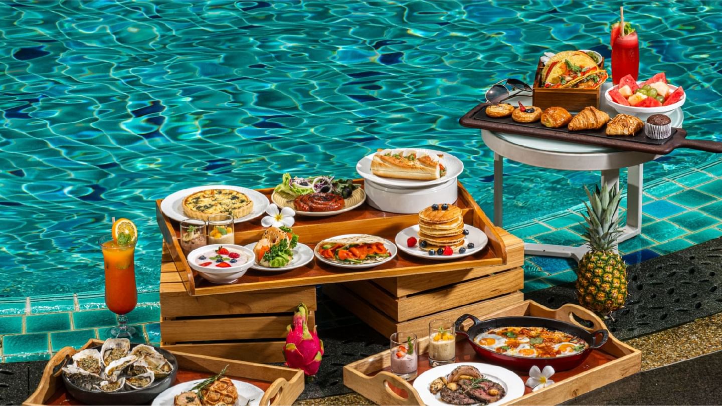 Buffet spread by the pool at Sunway Hotel Pyramid, featuring Splash & Brunch buffet offer