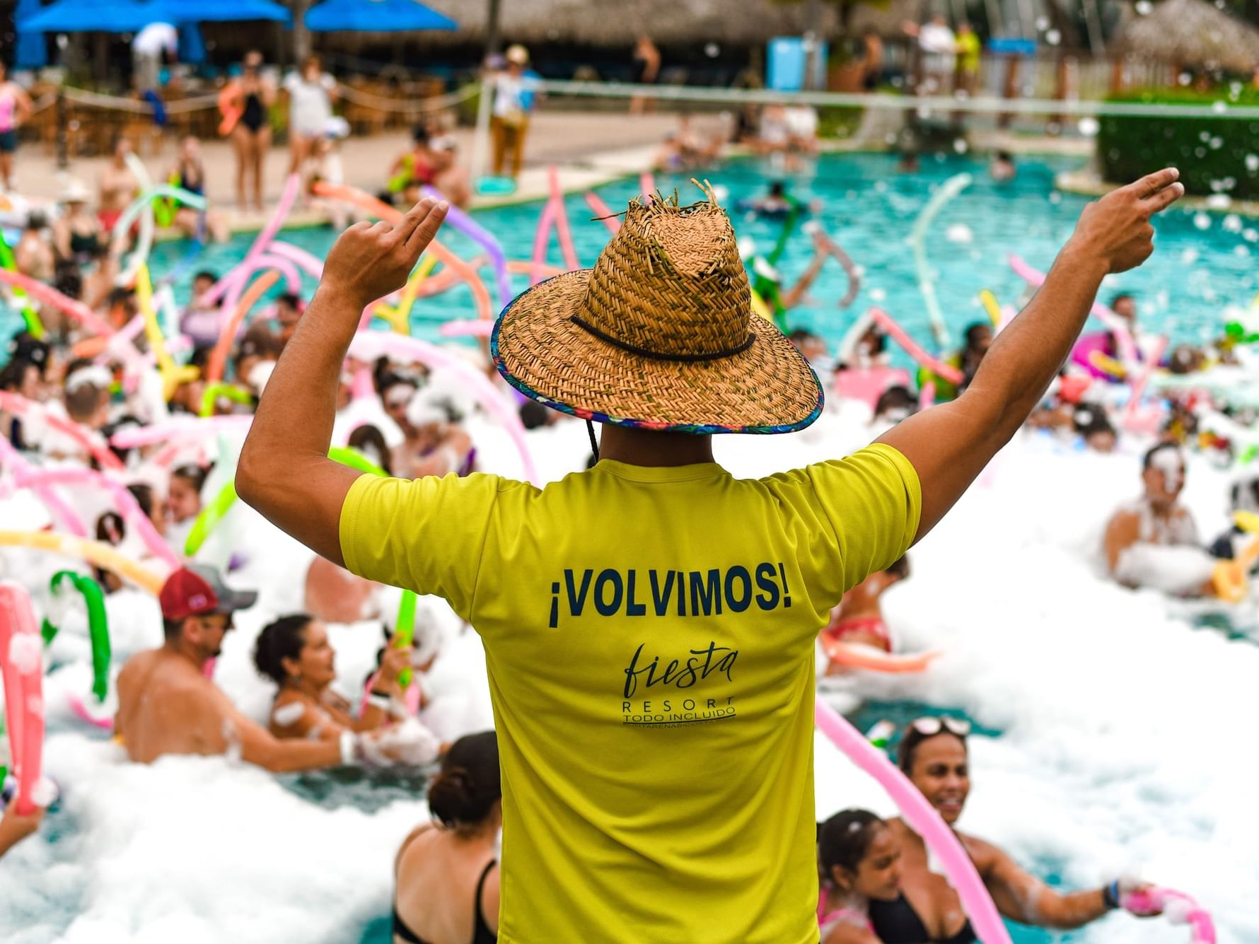 Group of people enjoying the outdoor pool at Fiesta Resort