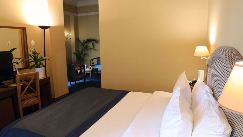 King bed with premium bedding in Junior Suite at Warwick Palm Beach Hotel - Beirut