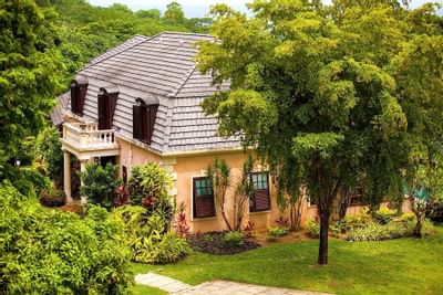 Exterior of Tobago villa with garden view
