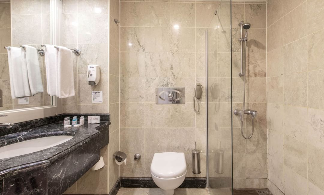 Shower area with a mirror in Suite bathroom at Bodrum Imperial