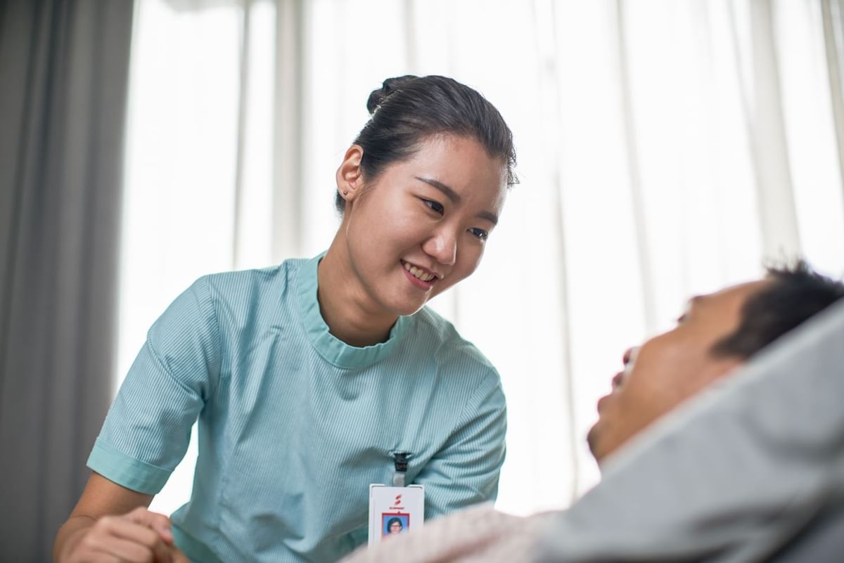 Nurse in Sunway Medical Centre Velocity checking up on patient at Sunway Velocity Hotel
