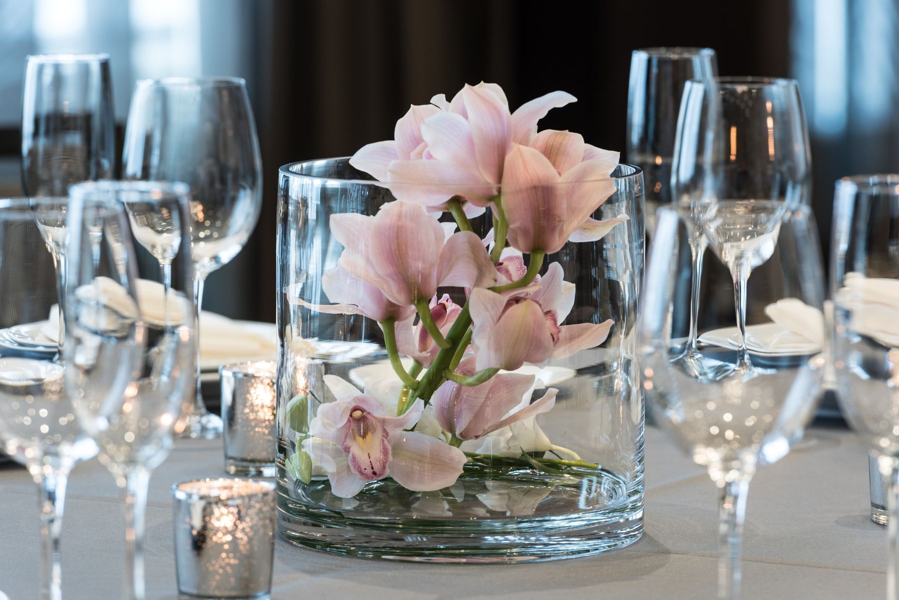 Floral centerpiece and wine glasses